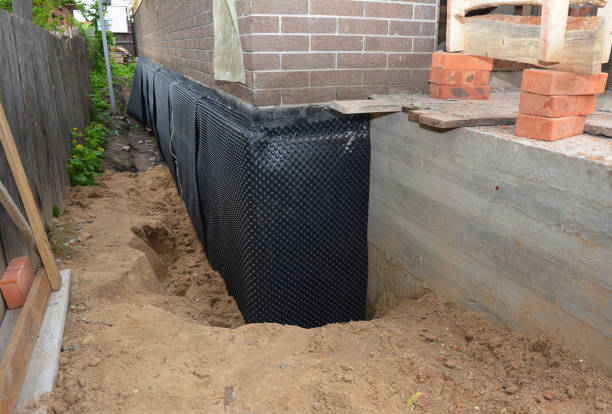 Happy homeowners after waterproofing job in Shiloh